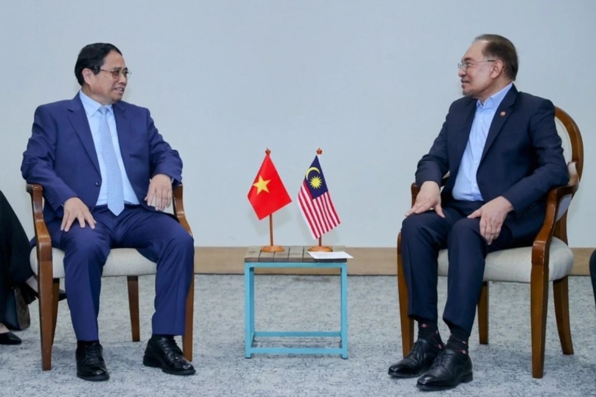 Pôa Phạm Minh Chính Ngế pro xiâm hnê ngăn tơnêi têa trâm mâ pôa Anwar Ibrahim Ngế pro xiâm hnê ngăn  kong têa Malaysia