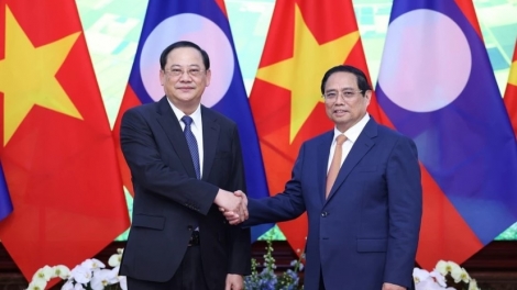 Thủ tướng teh đak bơ̆n Phạm Minh Chính tơƀơ̆p pơma đam hăm Thủ tướng teh đak Cộng hòa Dân chủ Nhân dân Lào 