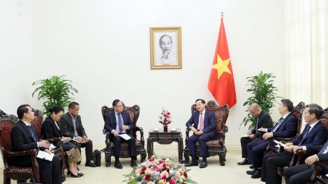 Phó Thủ tướng ồng Lê Minh Khái wă Ƀộ trưởng Ƀộ Tài cíñ lơgar Lào